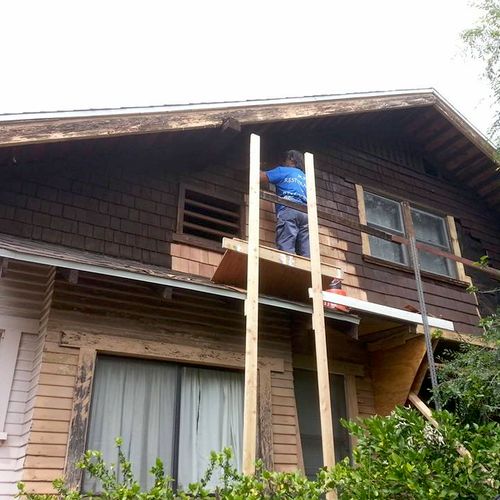replacing cedar shingles, windows trim, and rotted