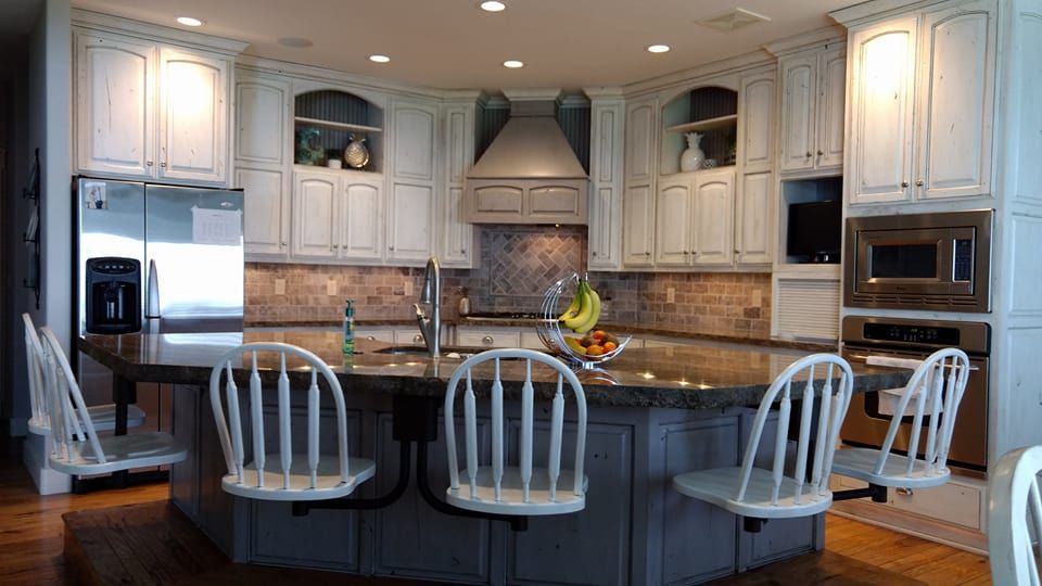 We can refinish your cabinets or re-design it and 