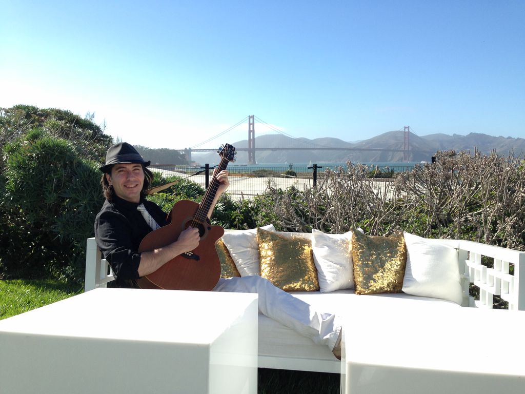 Outdoor wedding with acoustic guitar and wireless 