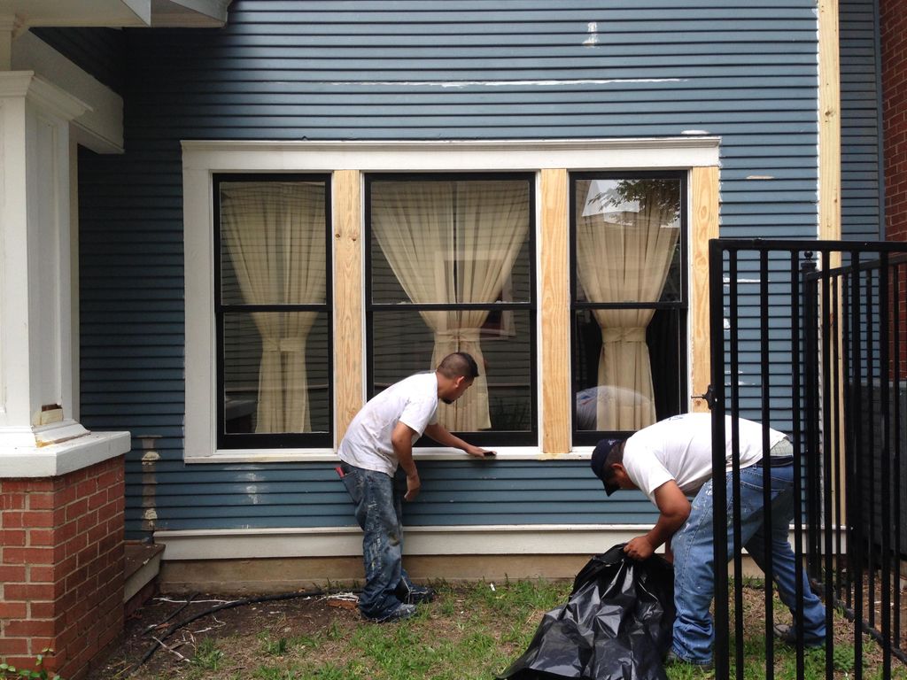 Exterior repaint with wood replacement.