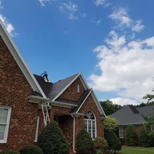 Are Guys Roofing a house in North Greensboro