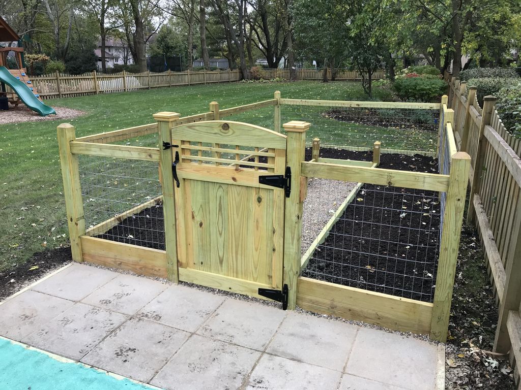 Right Corner 9x16x4 foot tall gated and stone path
