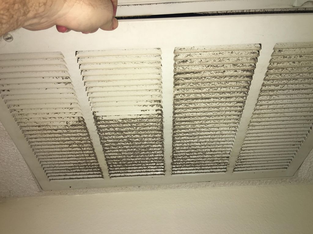 Air Conditioner maintenance, cleaning a dusty, dir