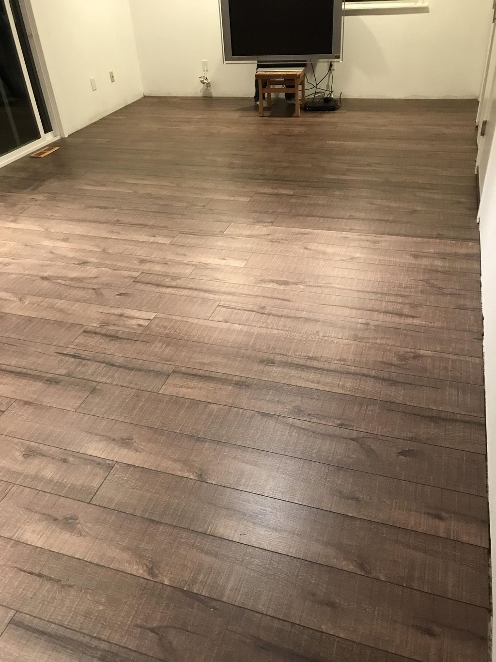 Engineered bamboo floating floor installation.