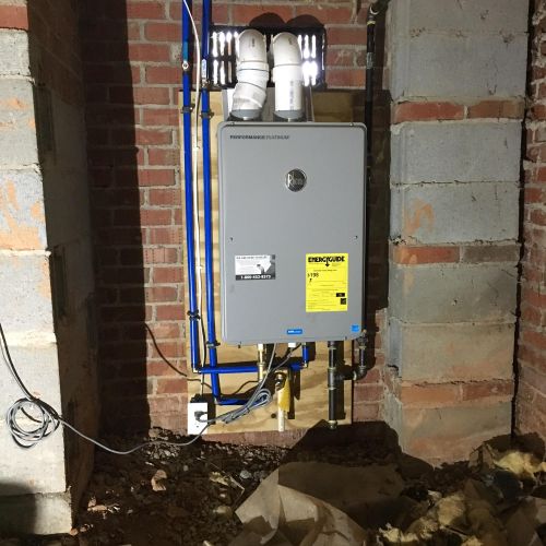 Tankless water heater installation in replacement 