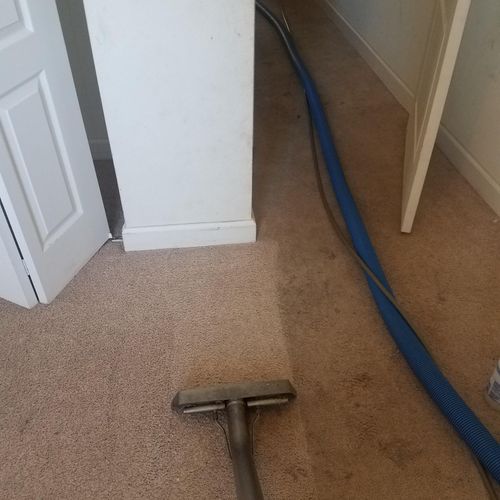 Steam cleaning a guest bedroom with dirty entrance