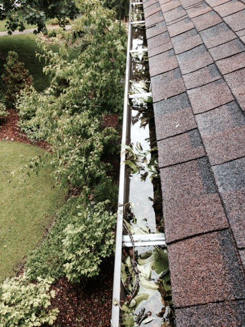 Clogged gutters after a hail storm in Denver 2015