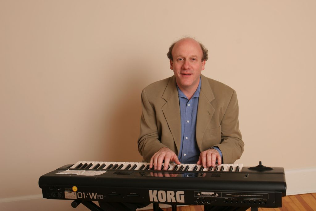 A still of Dan at the keyboard