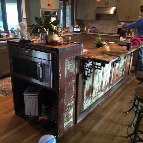 Custom kitchen island made from antique doors.