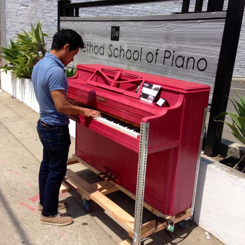 Playing our #pinkpiano outside of the school