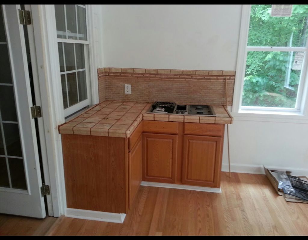 Sunroom Addition Complete with custom cabinetry/gr