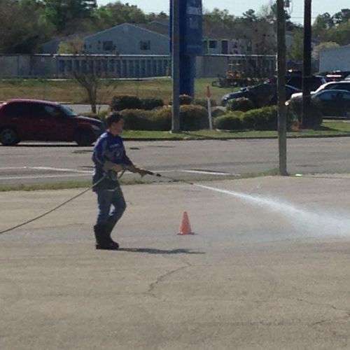 This is us power washing our church parking lot, g