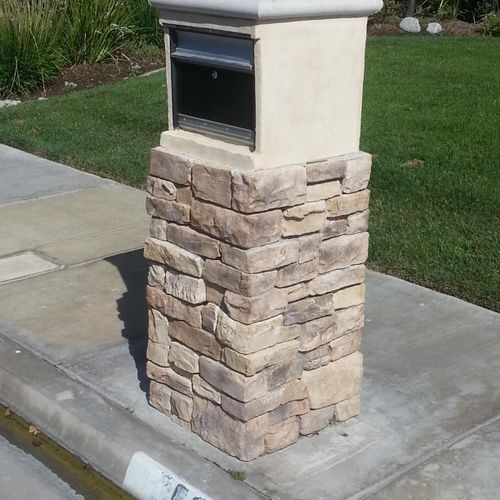 New block, arch. stone, and stucco mailbox fabrica