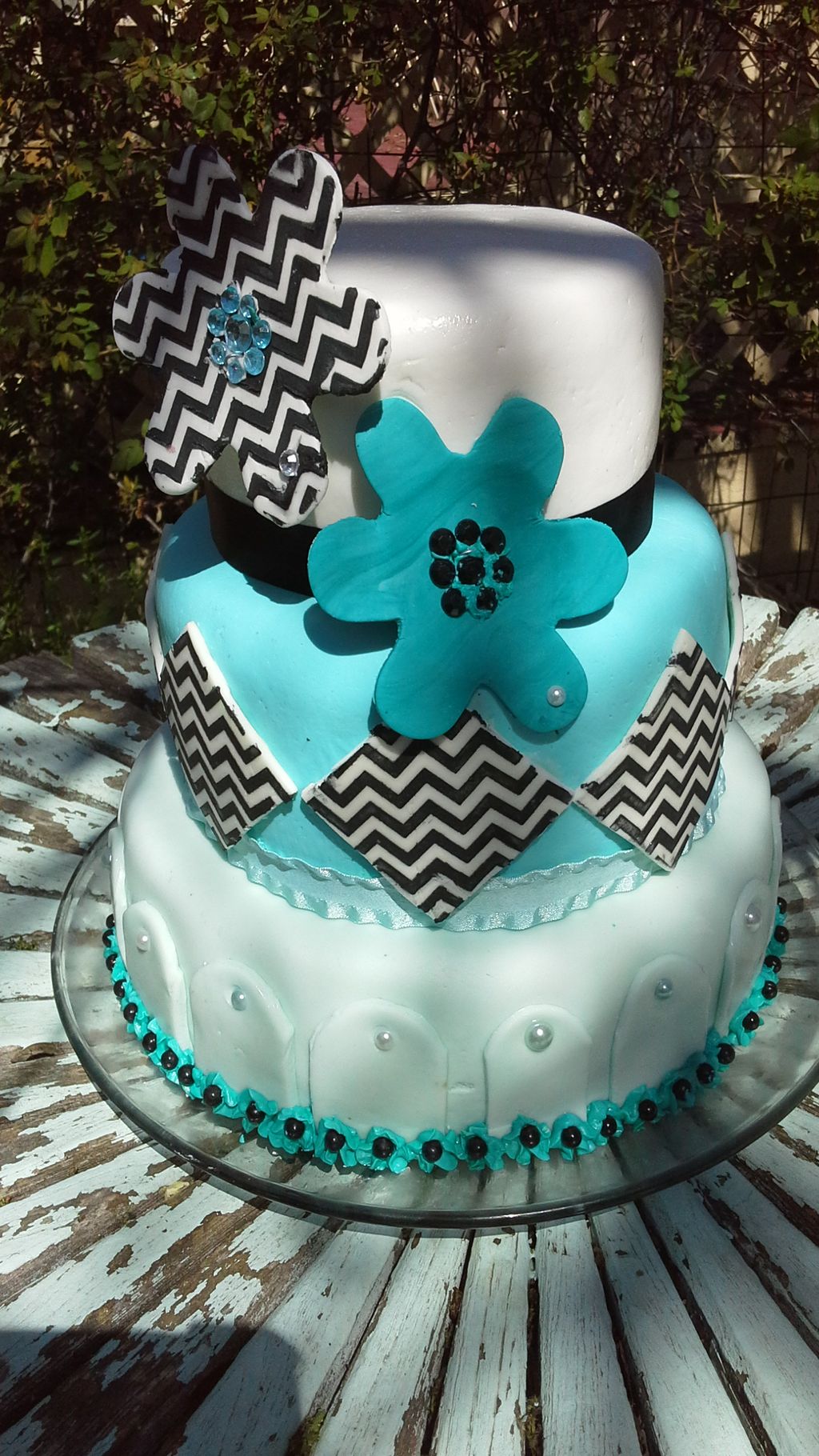 Chevron stenciled and custom flower 3 tier cake. C