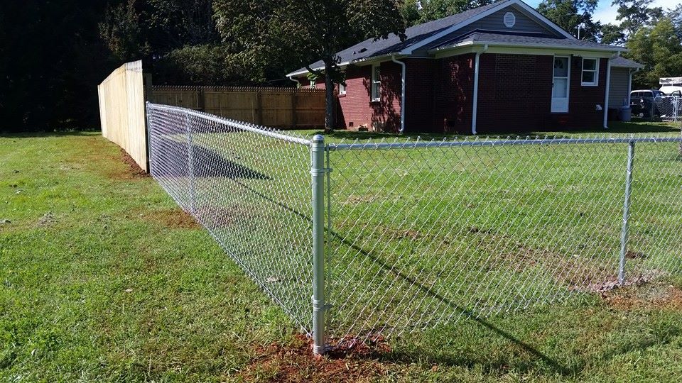 4 foot chain link with 6 foot privacy Gothic picke