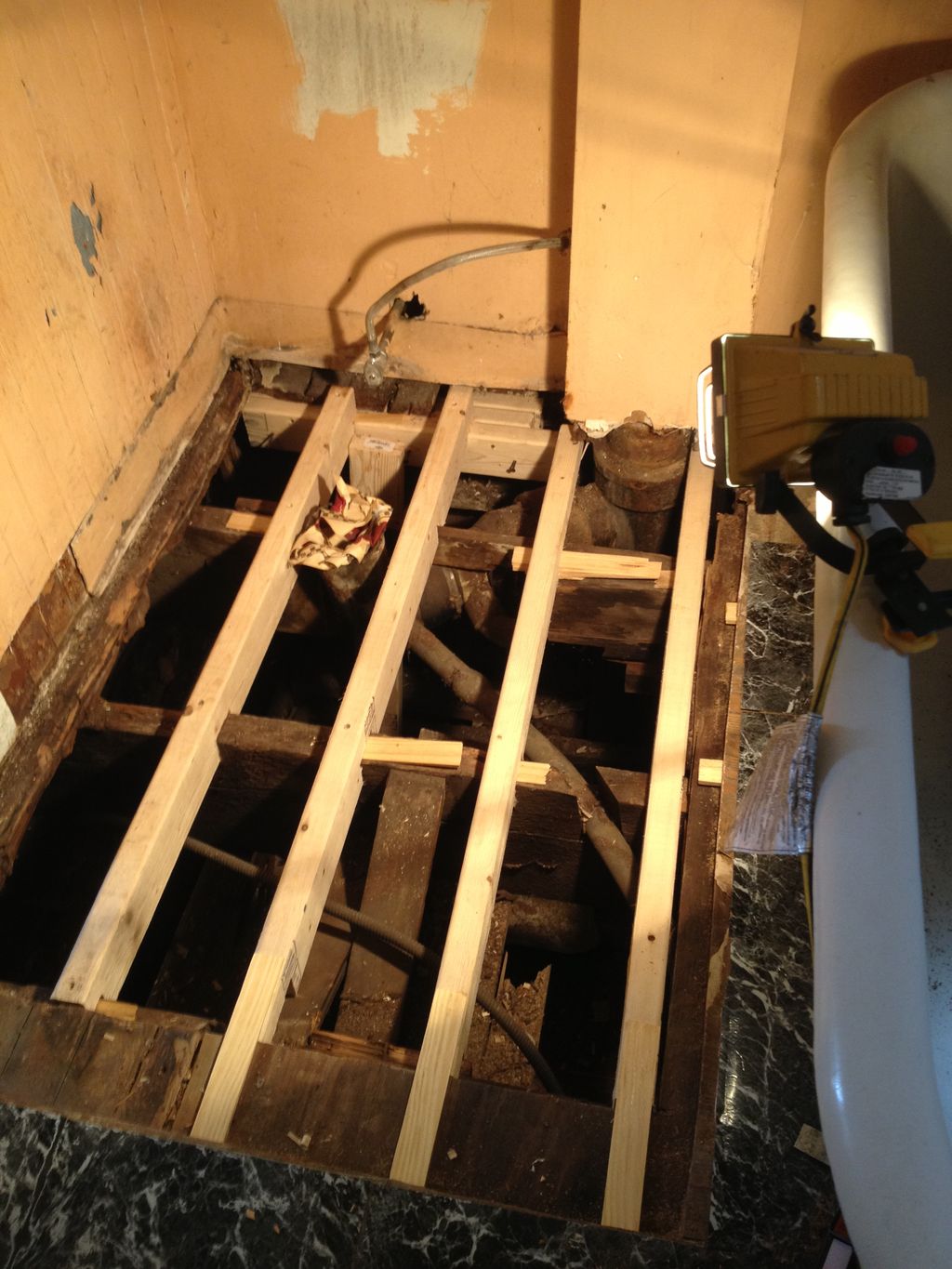 Sinking bathroom subfloor repair 10/2013