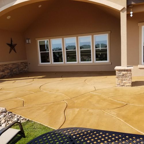  Gorgeous custom control joint colored patio. 