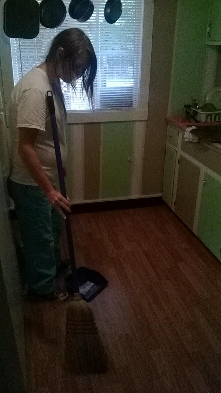 Amanda cleaning a weekly customers house.