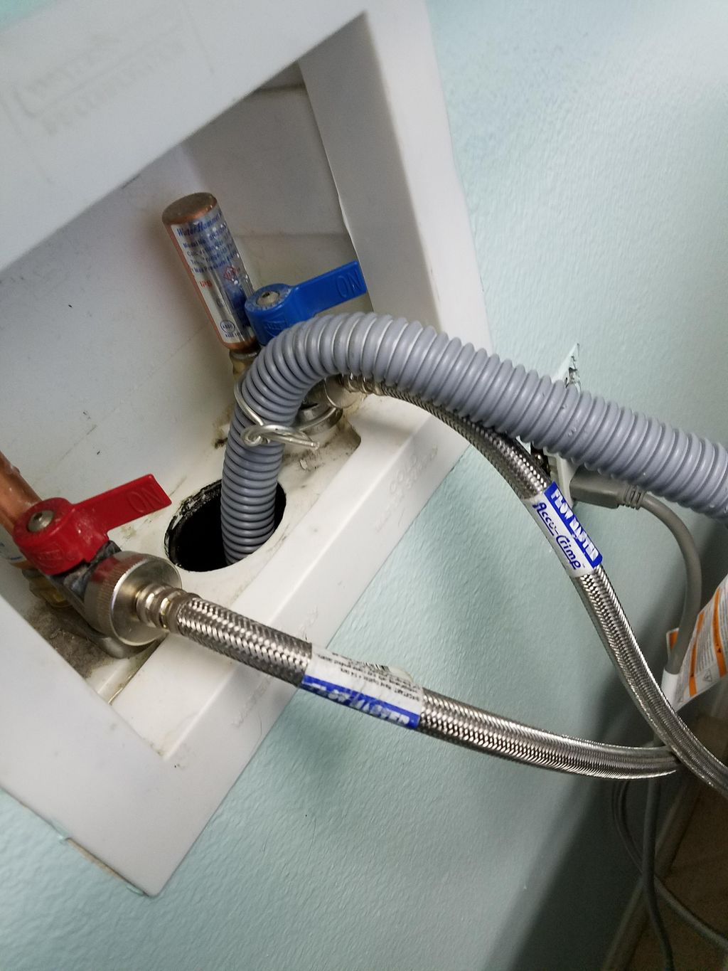 A washing machine hook-up that was completed for a