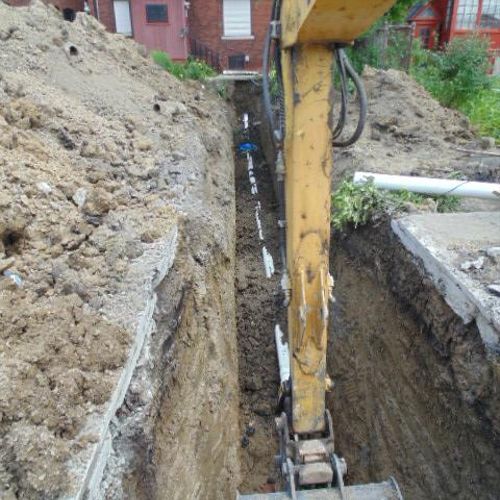 Excavation for a new sewer pipe taking place.