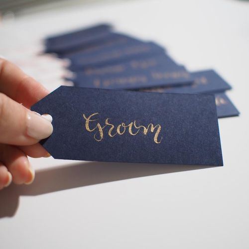 calligraphy name tag - gold on blue