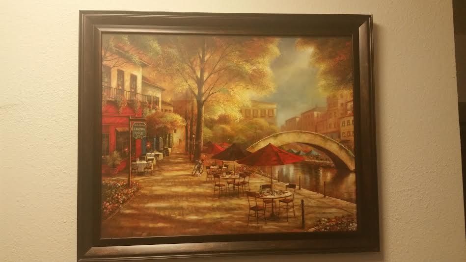 Dust your office wall art!