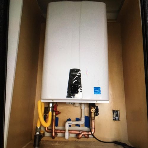 Install in a laundry cabinet of a Navien Tankless 