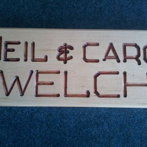 Hand-Routed Sign for Neil & Carol Welch's home.