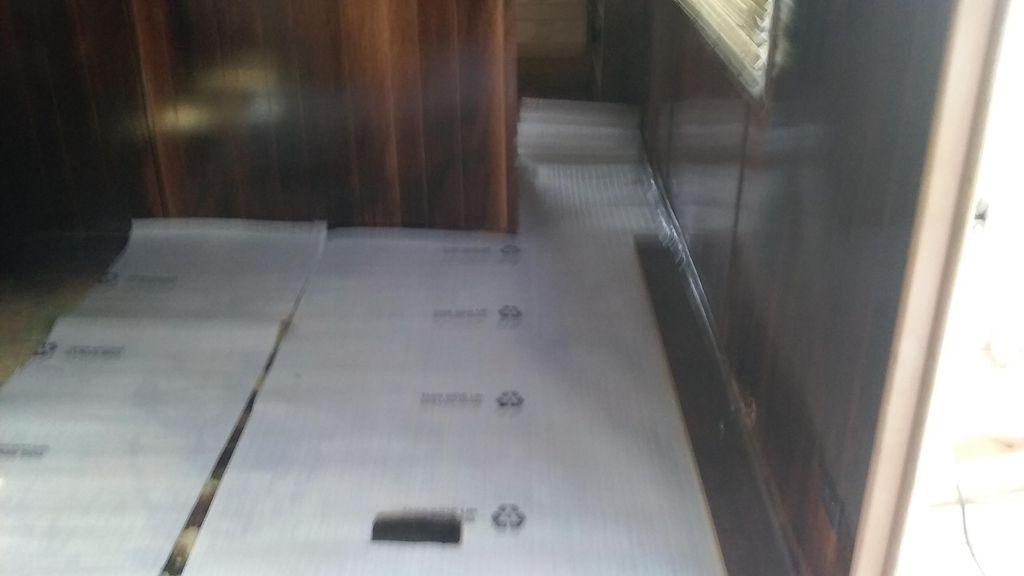 BEGINNING STAGE OF LAMINATE FLOORING INSTALATION.