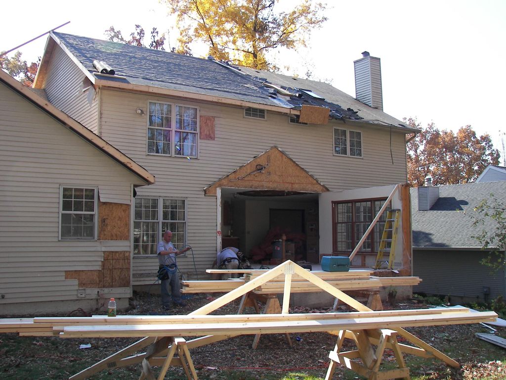 A LARGE TREE FEEL THROUGH THE UPPER ROOF AND SUNRO
