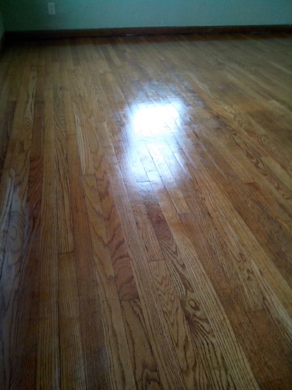 The after of a Hard wood flooring reconditioning