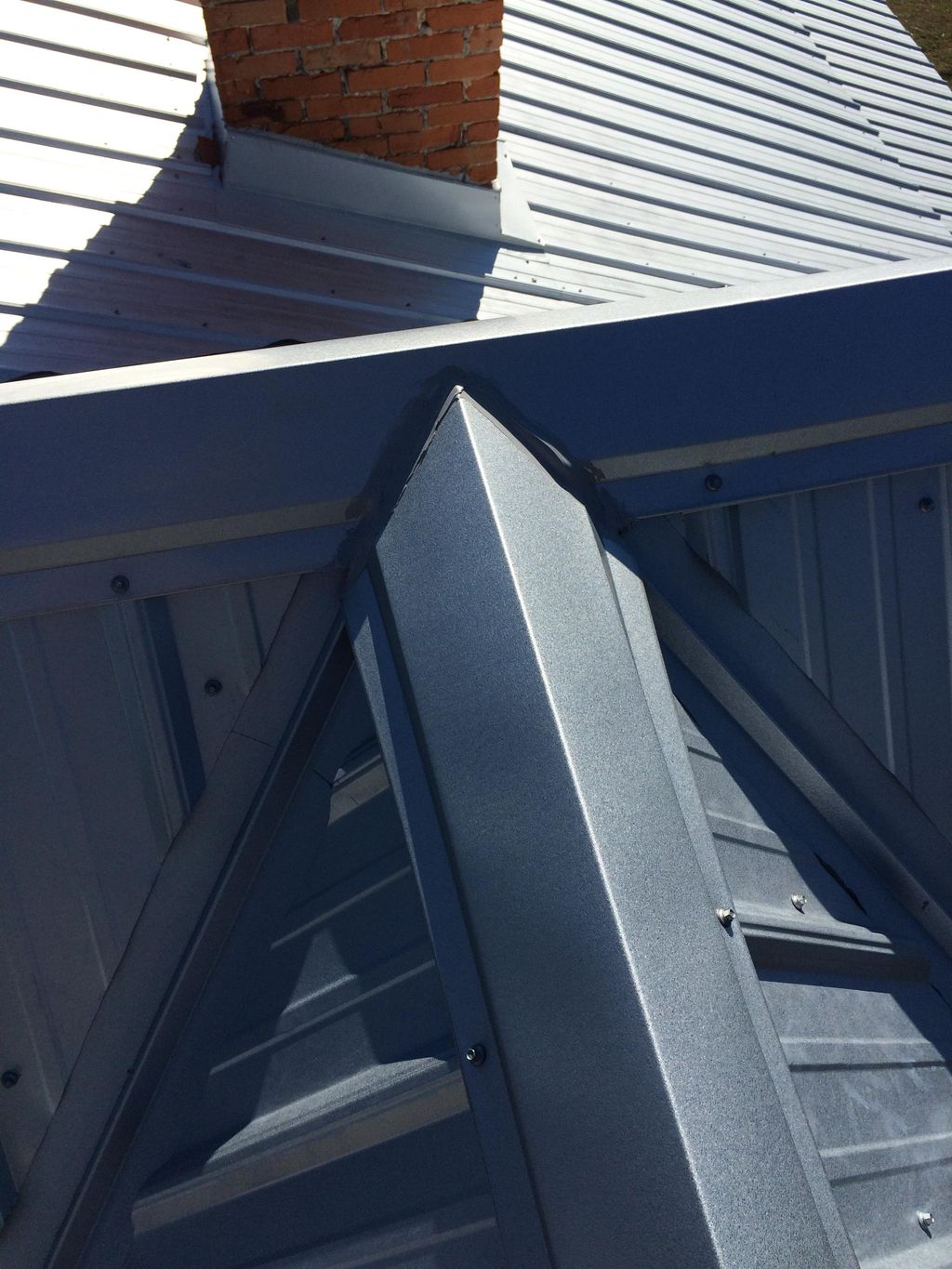 Galvalume Metal roof ridges intersecting