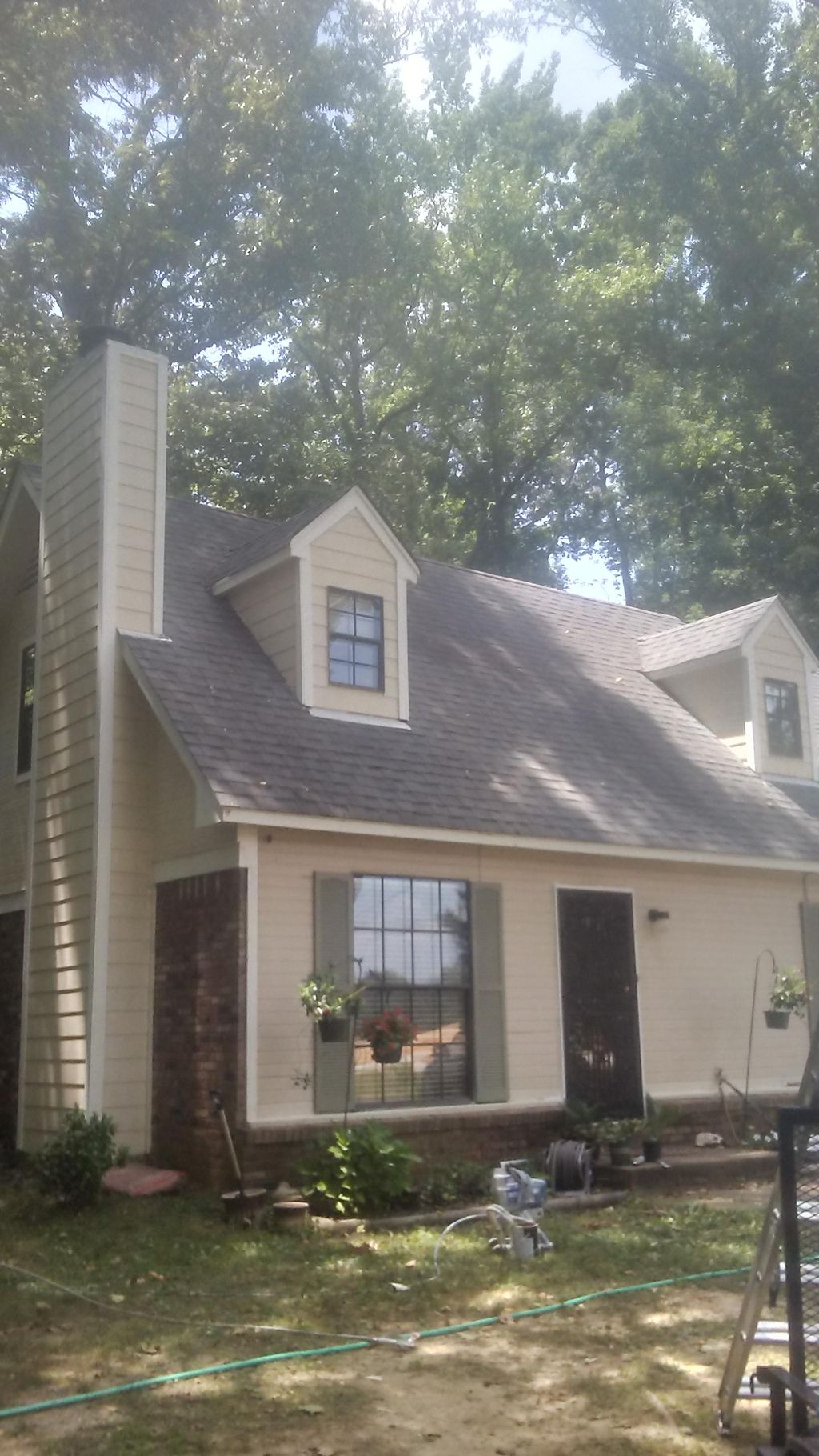 new hardie board lap siding on chimney and dormers