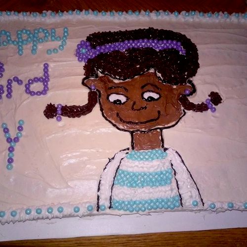 Sheet Confetti cake with hand drawn Doc McStuffins