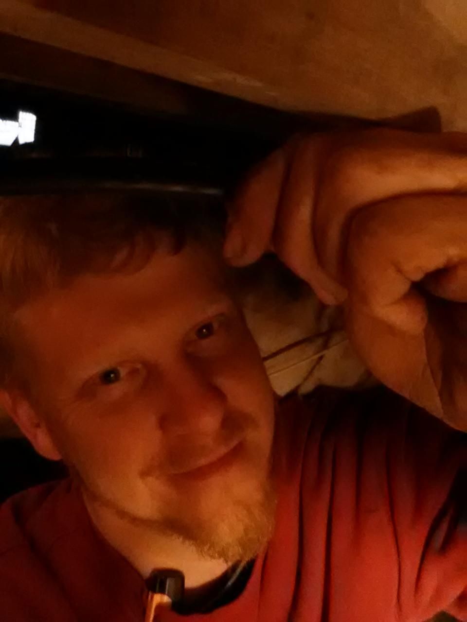 underneath a customer's house during a bathroom re