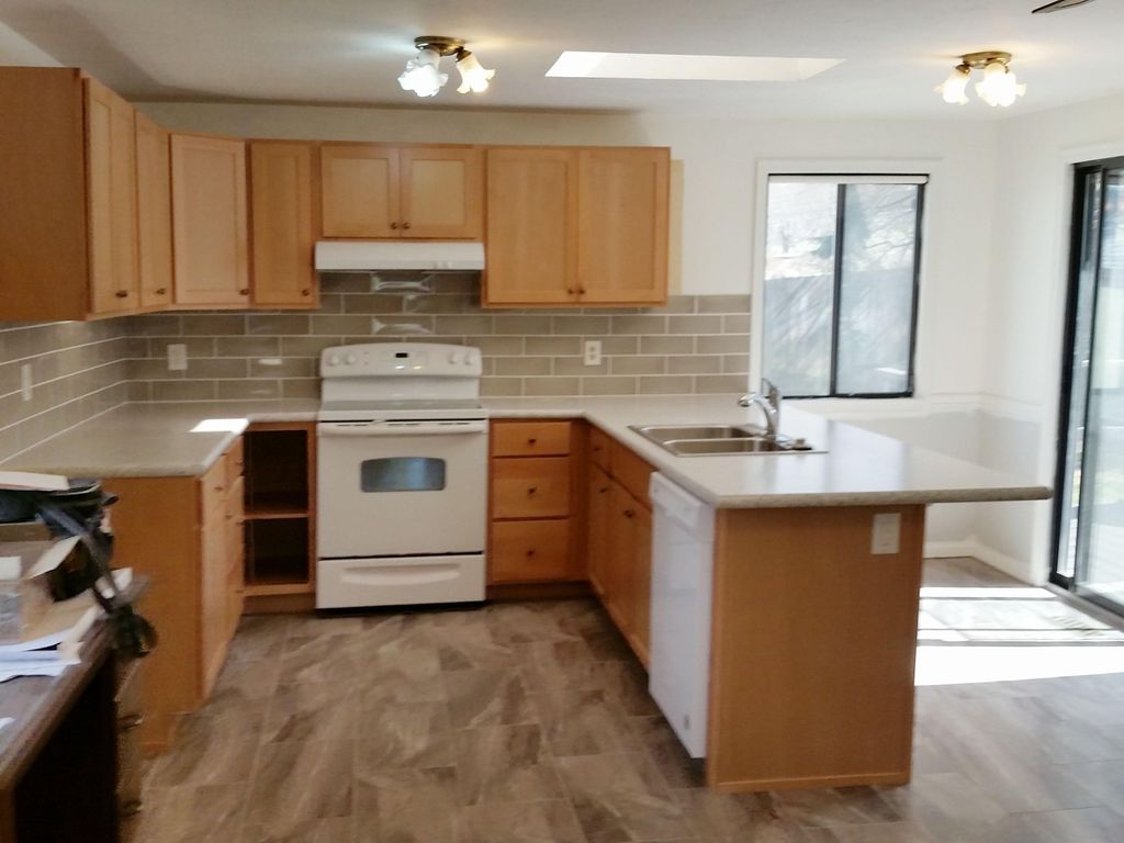 To dazzling with new cabinets, countertop, tile ba