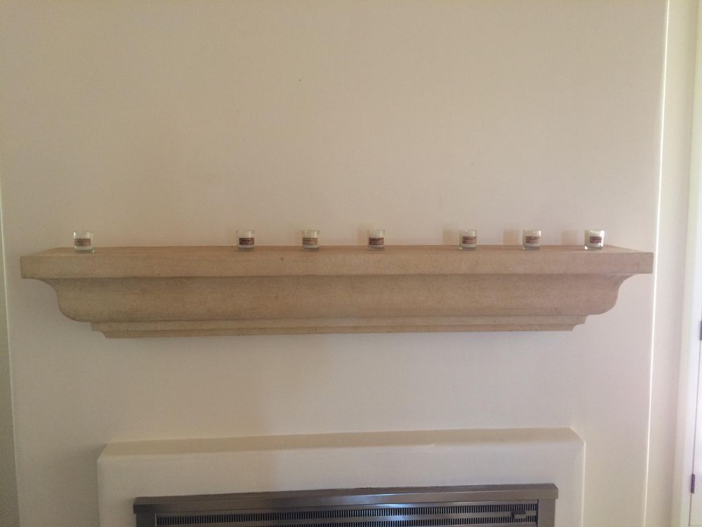 Travertine mantel installed recently.