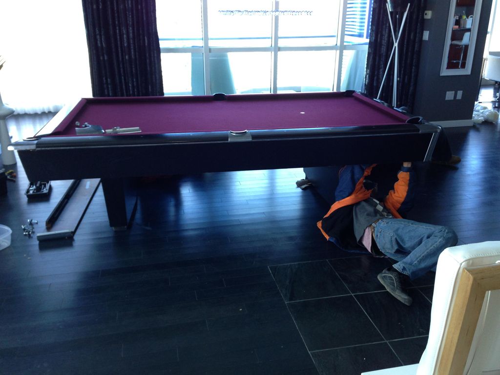 Pool table disassembled and assembly