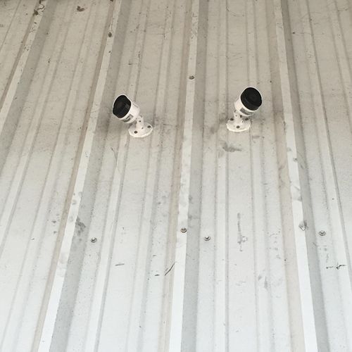 Cameras mounted outside of warehouse.