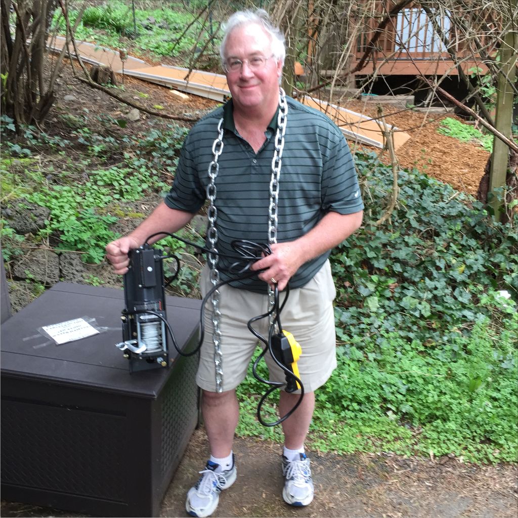 Don preparing to hoist a piano up a bank.