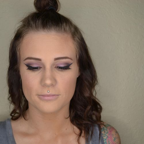 Purple/pink defined crease with a dramatic wing an