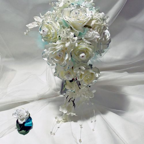 Silk wedding bouquet and groom's boutonniere