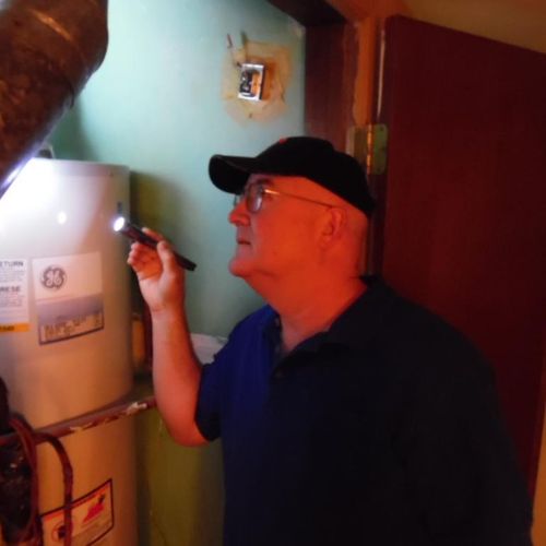 Inspecting water heater.