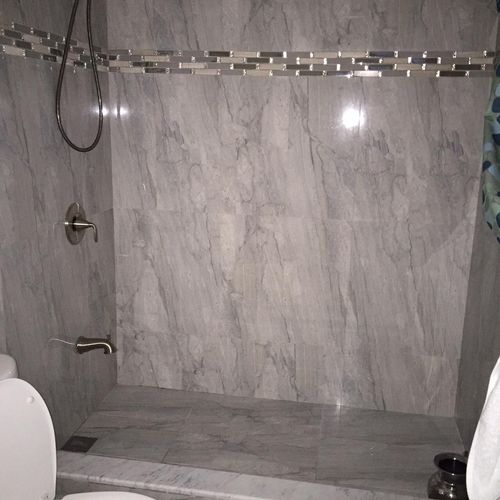 Marble tile with two shower heads, Front facing an