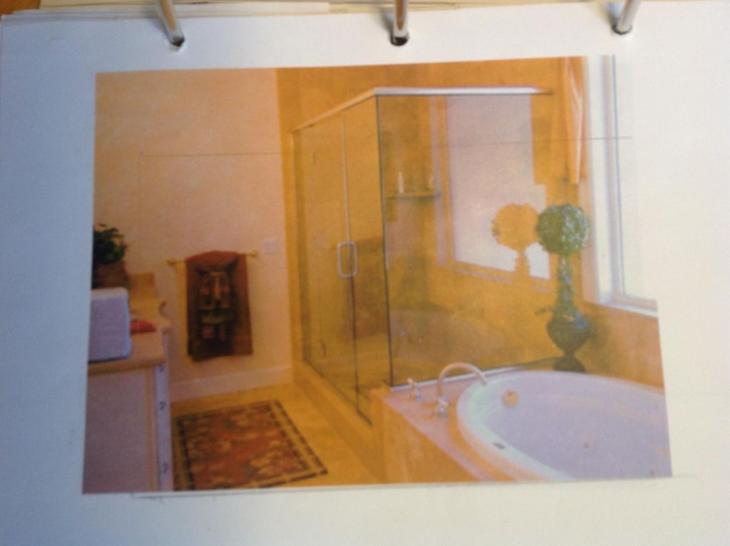 set in tub with separate glass shower enclosure an