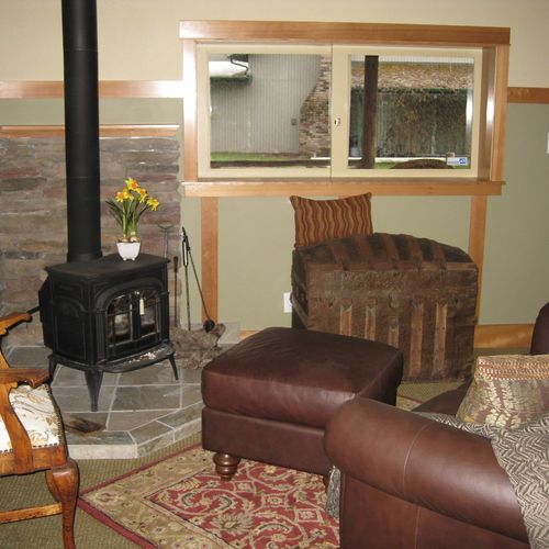 Open living area, stack stone FP hearth and walls 