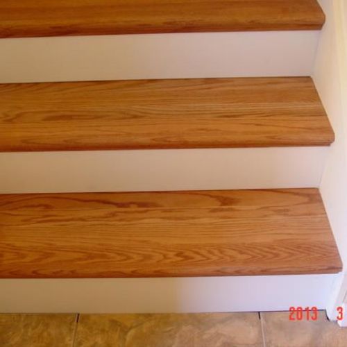 Solid Oak Stair treads with a white riser. Replace