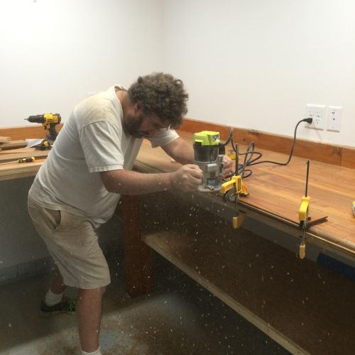 Me working on the New and Improved computer bench!