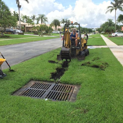 Trenching to install a french drain 