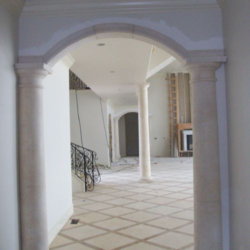Marble columns and archway all throughout this hom